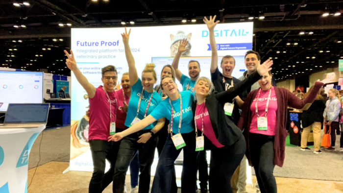 group shot of the digitail team looking excited and happy to be at VMX